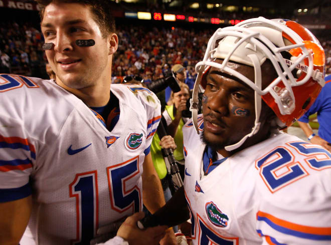 James (right) was part of Florida's top-ranked 2006 recruiting class with Tim Tebow (left). (Streeter Lecka/Getty Images)