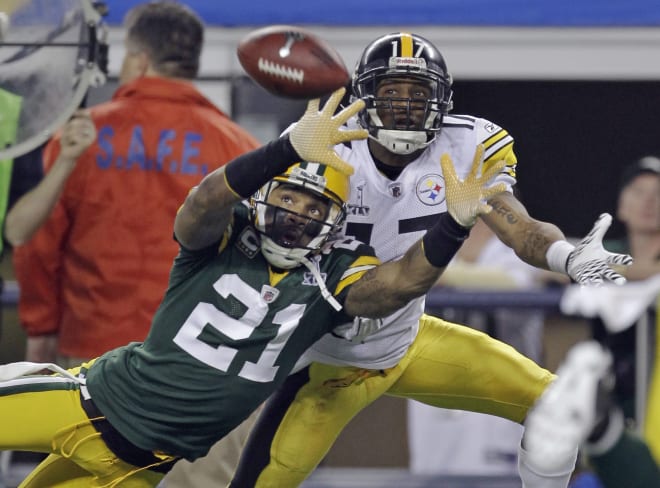 Michigan Wolverines football Heisman Trophy winner Charles Woodson won a Super Bowl with the Green Bay Packers.
