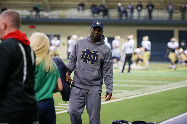 Running backs coach Autry Denson is emphasizing competition to challenge incumbent Josh Adams.