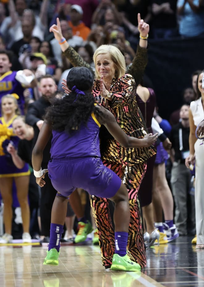LSU women's head basketball coach Kim Mulkey is hugged by freshman guard Flau'jae Johnson in the final seconds of the Lady Tigers' national championship game win over Iowa on April 2 in Dallas.