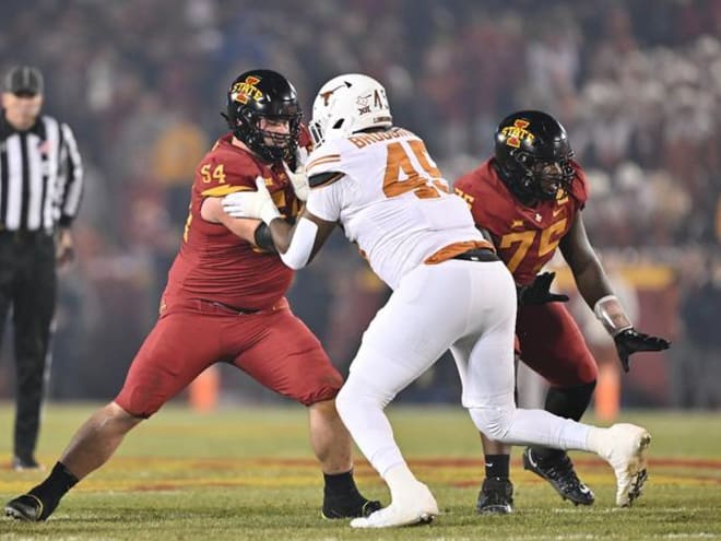 Jarrod Hufford, seen here blocking a Texas defender this season, was the Cyclones' highest-graded run and pass blocker.