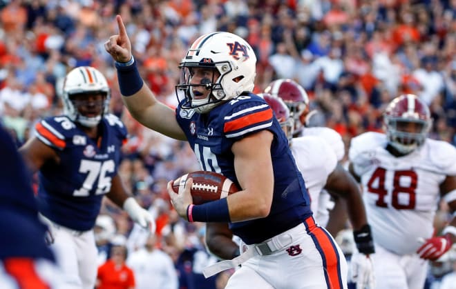 Bo Nix runs for a touchdown in the 2019 Iron Bowl.