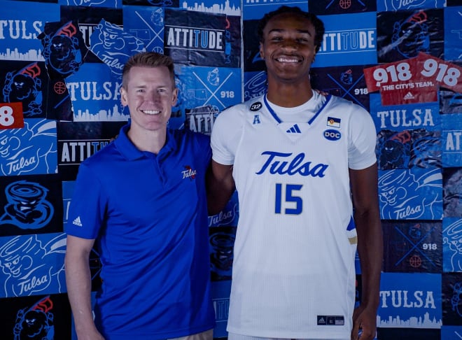 KJ Martin with Tulsa head coach Eric Konkol.