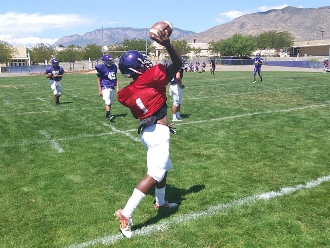 Jordan Byrd attempts a pass during Monday's practice at MHS