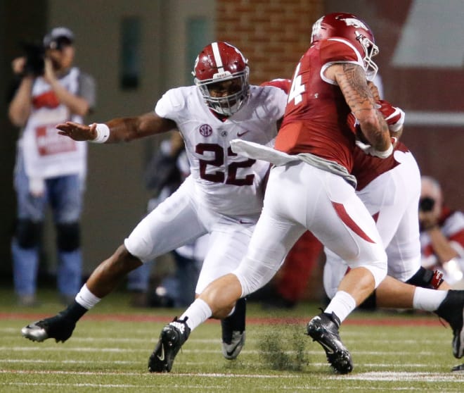 Alabama linebacker Ryan Anderson (22) makes a tackle on Arkansas tight end Austin Cantrell during Alabama's 49-30 win over the Razorbacks in Fayetteville Saturday, October 8, 2016.
