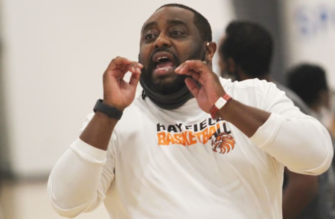 Carlos Poindexter directed Hayfield to a record-setting 32-0 season, culminating in the program's first ever State Championship