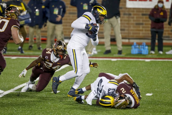 Michigan Wolverines football defensive tackle Donovan Jeter recovered a fumble and ran it back for a touchdown on Saturday night against Minnesota.