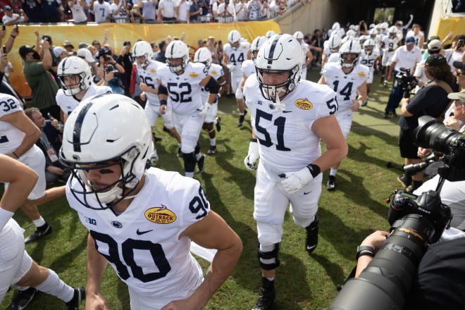 Jan 1, 2022; Tampa, FL, USA; Penn State Nittany Lions offensive lineman Jimmy Christ (51) runs onto the field before the game against the Arkansas Razorbacks during the 2022 Outback Bowl at Raymond James Stadium. Mandatory Credit: Matt Pendleton-USA TODAY Sports