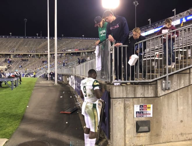 USF quarterback, Quinton Flowers signs autographs for UConn fans after putting up 519 yards offense in USF's 37-20 victory over the Huskies.