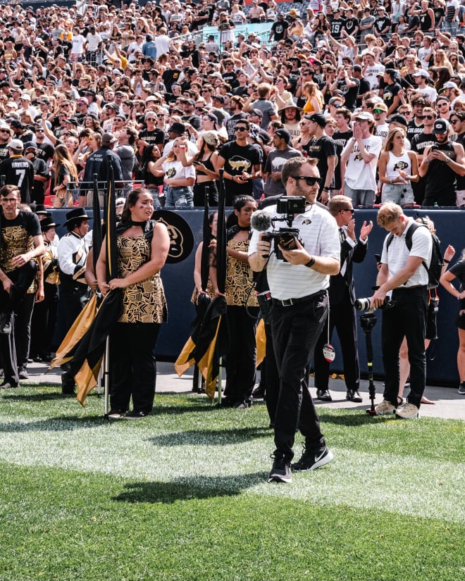 John Snelson in action on the sidelines of Folsom Field