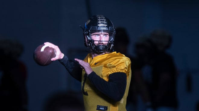 Purdue Boilermakers quarterback Hudson Card (1) passes the ball during Purdue football practice, Tuesday, March 19, 2024, at Mollenkopf Athletic Center in West Lafayette, Ind.