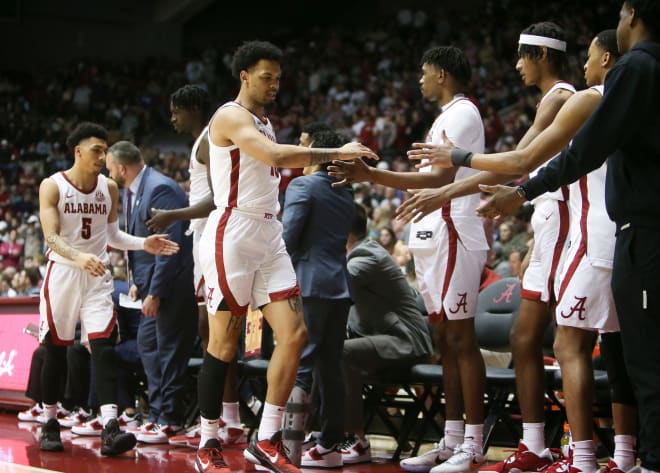 Alabama guard Jahvon Quinerly (5) and Alabama guard Dom Welch (10) return to the bench after making a contribution during the game with Mississippi State at Coleman Coliseum. Alabama came from behind to defeat Mississippi State 66-63. Photo |  Gary Cosby Jr.-Tuscaloosa News / USA TODAY NETWORK