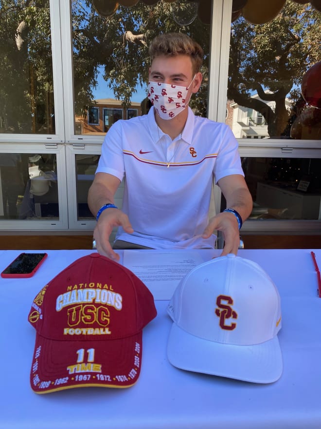 USC QB commit Miller Moss had an unsuspenseful hat choice at his signing ceremony Wednesday.