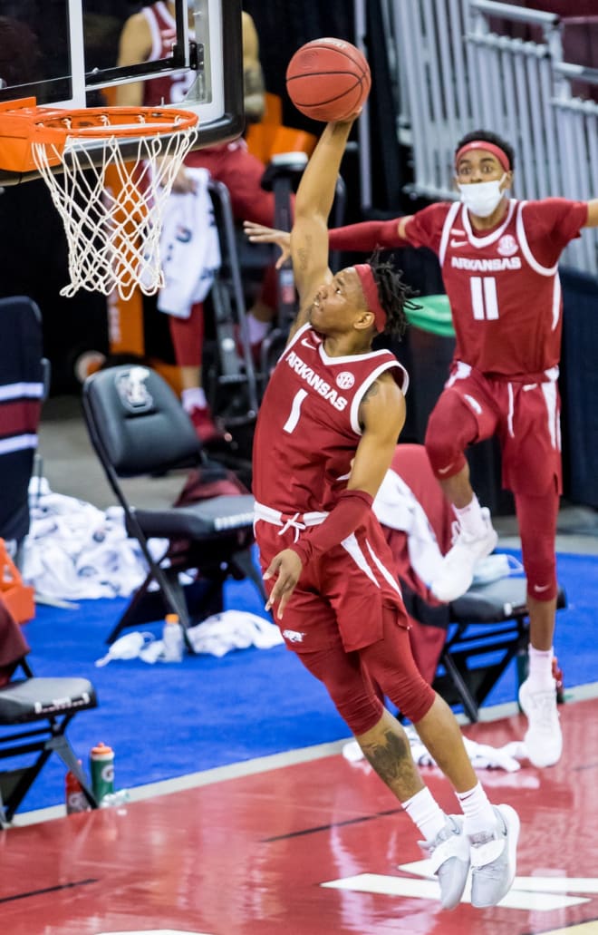 A detailed view of the Nike basketball shoes worn by Moses Moody