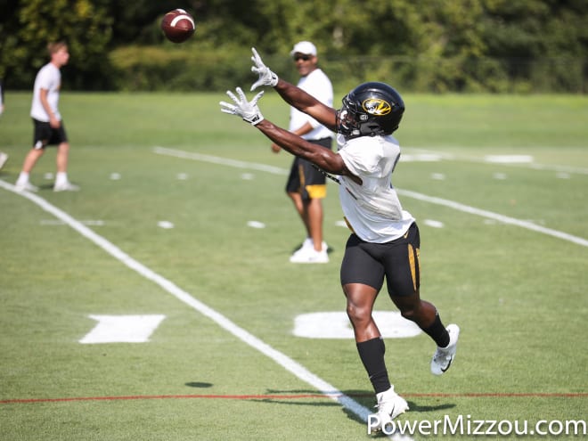 Garrick McGee, in his first year as Mizzou's wide receivers coach, watches Knox during practice