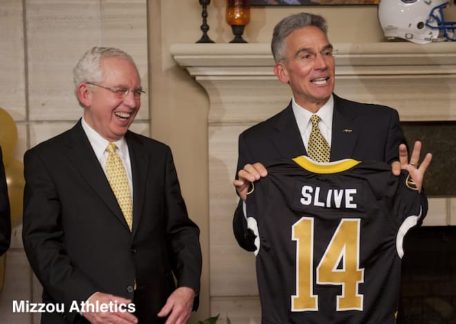 Missouri athletics director Mike Alden (left) presented a Mizzou jersey to Mike Slive on Nov. 6, 2011, the day Missouri officially announced it would join the SEC.