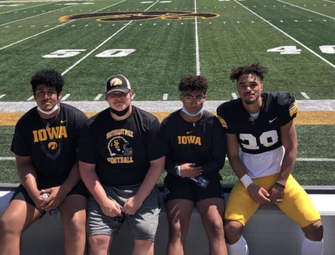 Kadyn Proctor, Cade Borud, Xavier Nwankpa, and Isaiah Wagner at Kinnick Stadium.