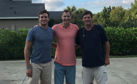 Jared Jackson (left) and his father, David (right), pose with former UF star Chris Doering during a trip to Gainesville. David Jackson actually was a standout golfer at UF during his college days.