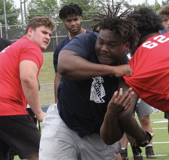 Life Christian Academy's Ike Thompson, who committed to James Madison last month, runs through a drill earlier this summer.