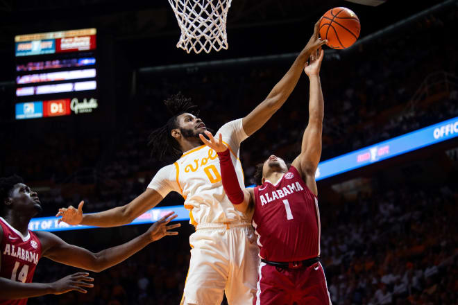 Tennessee forward Jonas Aidoo (0) blocks a shot by Alabama guard Mark Sears (1) during a basketball game between the Tennessee Volunteers and the Alabama Crimson Tide held at Thompson-Boling Arena in Knoxville, Tenn., on Wednesday, Feb. 15, 2023.  Photo | Brianna Paciorka/News Sentinel / USA TODAY NETWORK