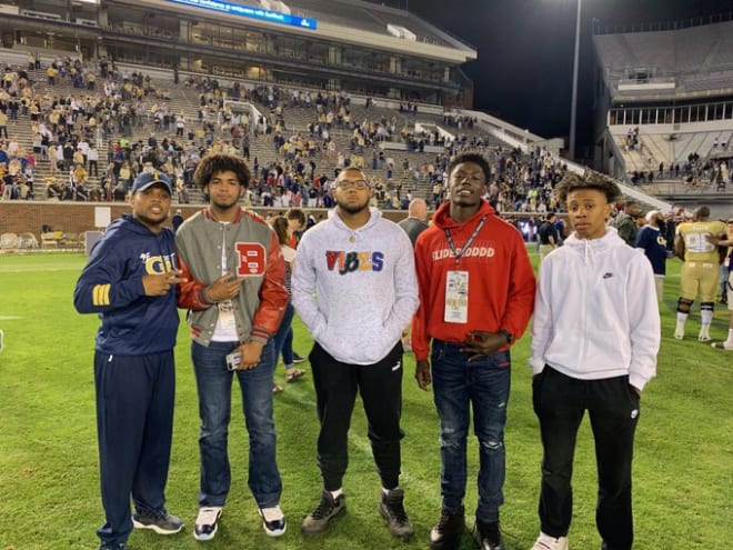 Johnson and some teammates at the spring game in April.