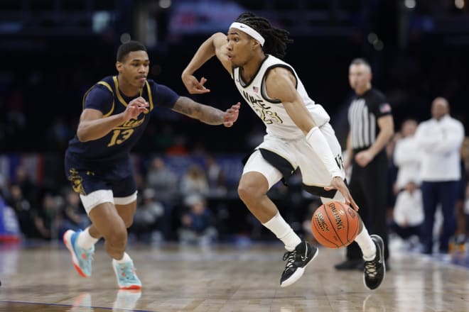 Wake Forest's Hunter Sallis drives past Notre Dame's Tae Davis on Wednesday. 