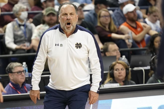 Mike Brey directs his Notre Dame men's basketball team for the last time, Tuesday in Greensboro, N.C.