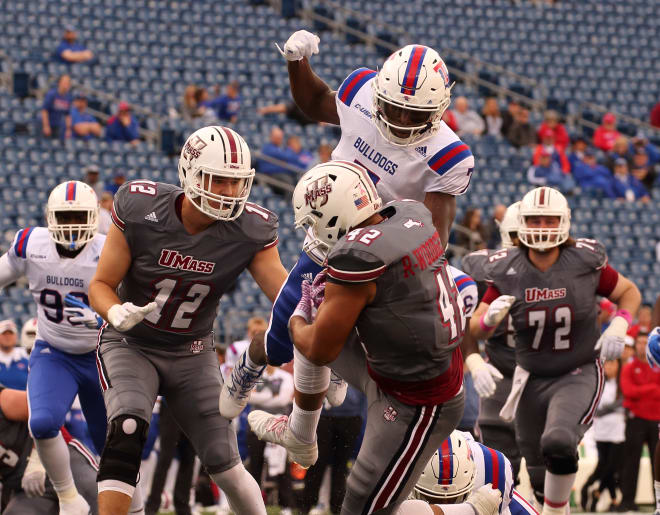 UMass and La. Tech players battle for possession of the ball last Saturday. 