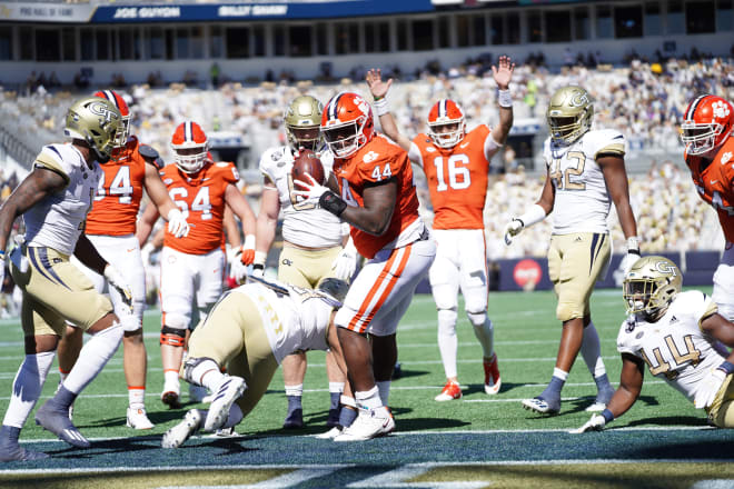 Defensive tackle Nyles Pinkney scores a touchdown for Clemson as a fullback one of three scores on the ground