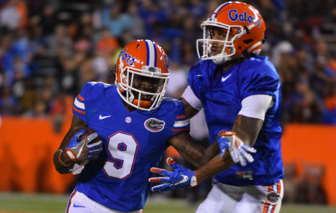Redshirt junior slot receiver Dre Massey (9) and sophomore wideout Tyrie Cleveland (right)