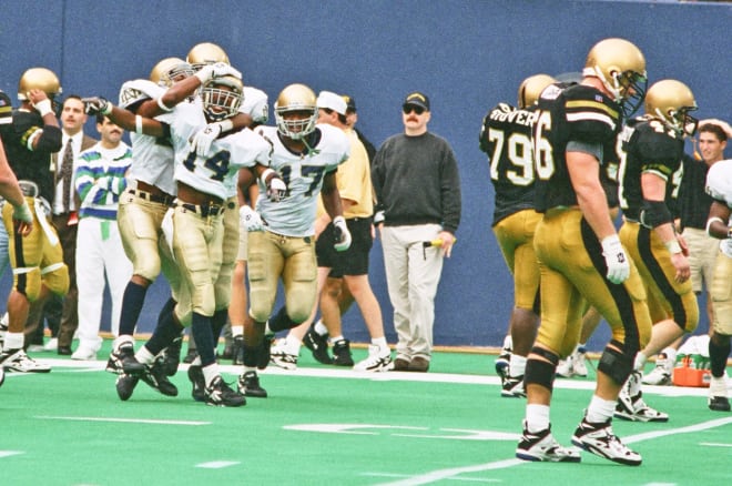 Cornerback Ivory Covington (14) made a game-saving tackle against Army in 1995.