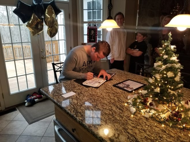 OL Harmon Saint Germain is in the Christmas & Signing Day Spirit as he makes it official