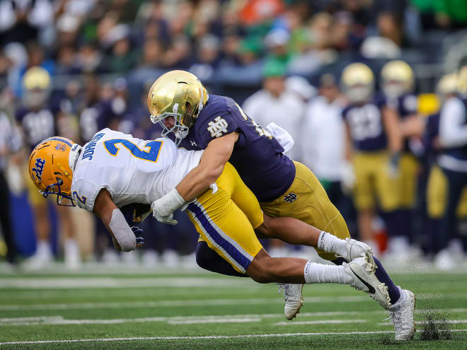 Linebacker Jack Kiser, pictured tackling Pitt wide receiver Kenny Johnson, is one of Notre Dame's highest-graded defenders by Pro Football Focus.