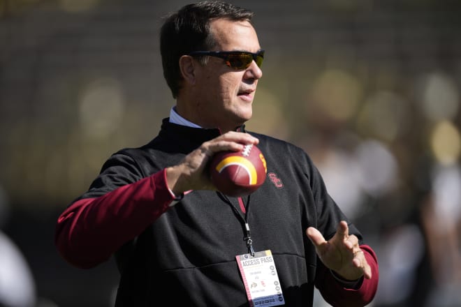 USC athletic director Mike Bohn is about to make the decision that will define his Trojans tenure.