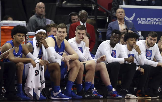 The Boise State bench watches during the final moments of the team's NCAA college basketball game against San Diego State in the Mountain West Conference men's tournament Friday, March 6, 2020, in Las Vegas.