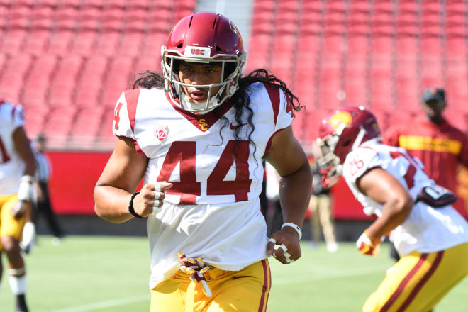 Freshman linebacker Tuasivi Nomura had grown up watching USC and considered it a dream school, but his recruitment wasn't so simple.