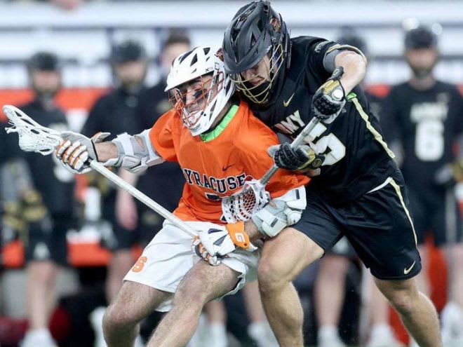 Syracuse midfielder Michael Leo (7) and Army West Point attack Christian Mazur (55) go at it in the third quarter at the JMA Wireless Dome