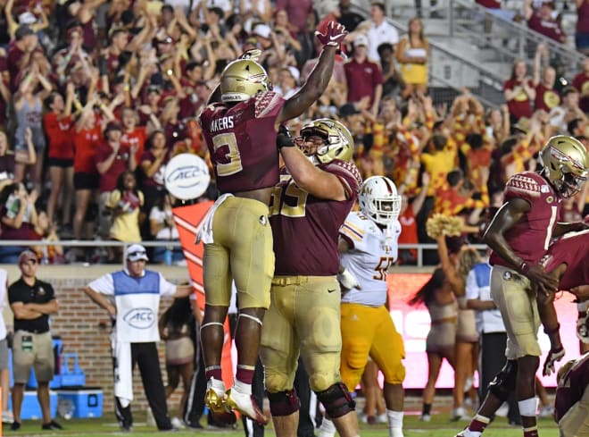 Cam Akers celebrates the go-ahead touchdown in overtime