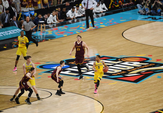Former Michigan Wolverines basketball guard Jaaron Simmons hit a three in the second half to lead U-M past Loyola Chicago in the 2018 Final Four.