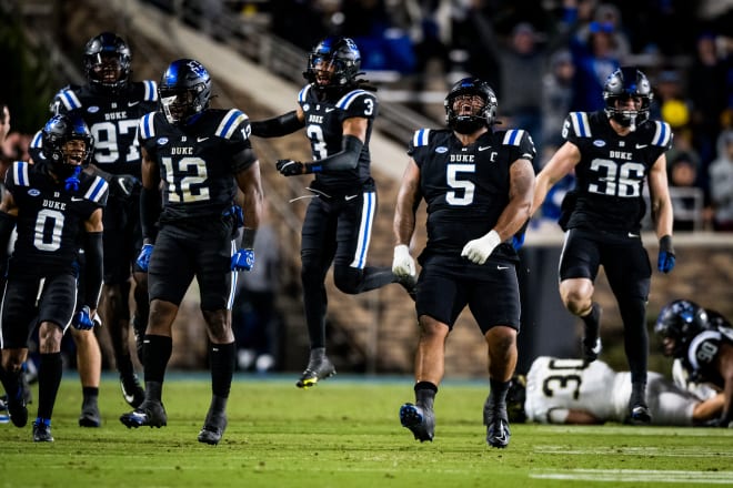 Duke's defense celebrates during Thursday night's win over Wake Forest. 