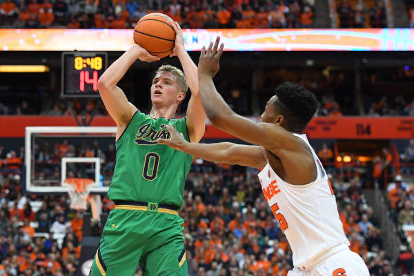Rex Pflueger scored the winning basket for the 51-49 win at Syracuse.