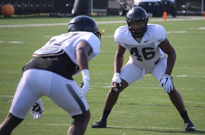 Cornel Jones (46) started a dozen games for Purdue last season, but is now competing with newcomer Ben Holt to keep that job.