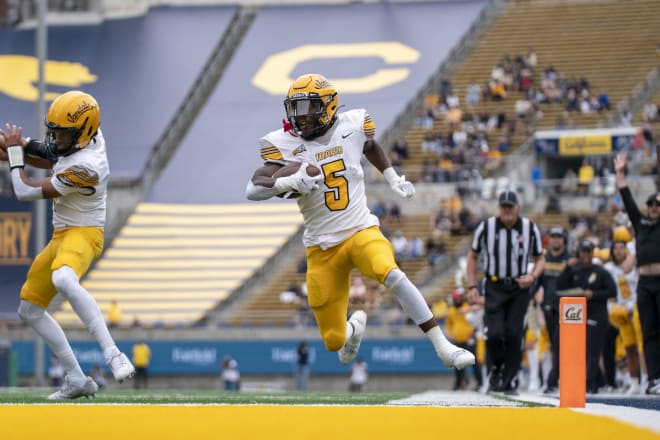 Anthony Woods scoring a touchdown at Cal. 