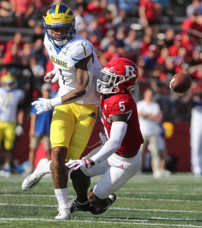 Delaware receiver Thyrick Pitts is kept from a catch by Rutgers defensive back Kessawn Abraham in the first quarter of Delaware's 45-13 loss at SHI Stadium in Piscataway, NJ, Saturday, Sept. 18, 2021. 