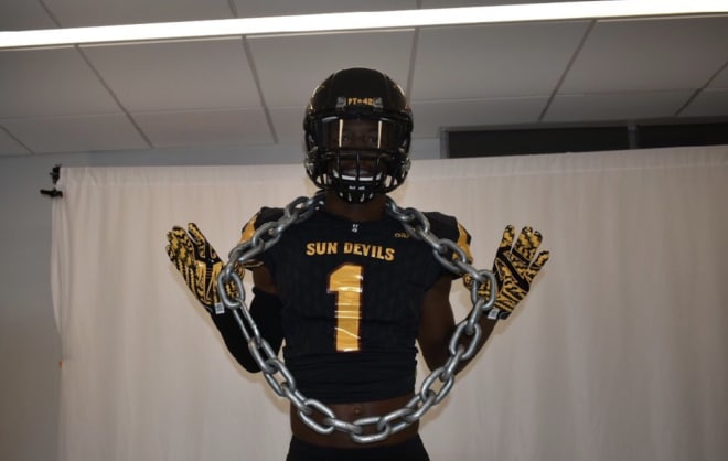 Quinyon Mitchell poses in ASU gear on his recent trip to ASU