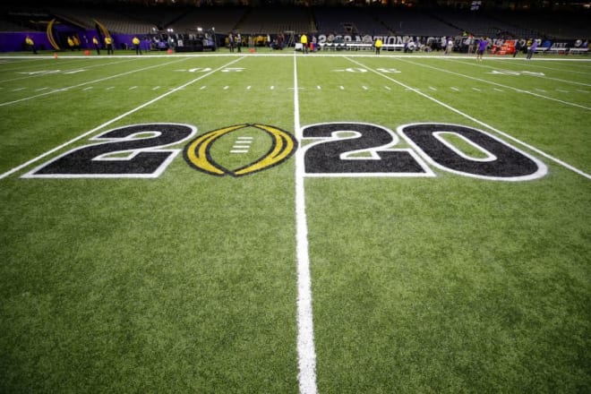 The CFB 2020 logo is displayed on the field prior to the College Football Playoff title game between LSU and Clemson on Jan. 13, 2020. (Todd Kirkland/Icon Sportswire via Getty Images)