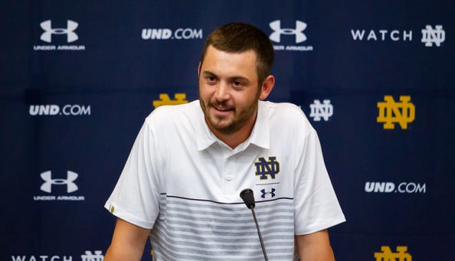 Notre Dame offensive coordinator Tommy Rees at a press conference