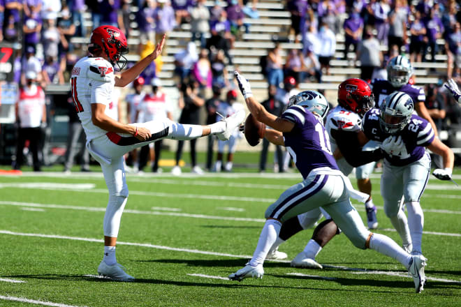 Kansas State receiver Seth Porter blocks a punt