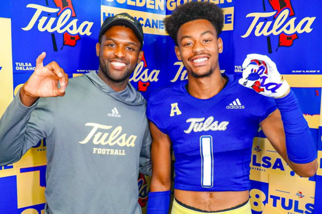 Zach Williams with Tulsa assistant Michael Hunter during a recent unofficial visit.