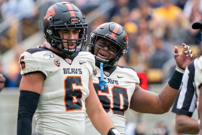 Oregon State defensive tackle Jordan Whittley (right) has an offer from Michigan Wolverines football.
